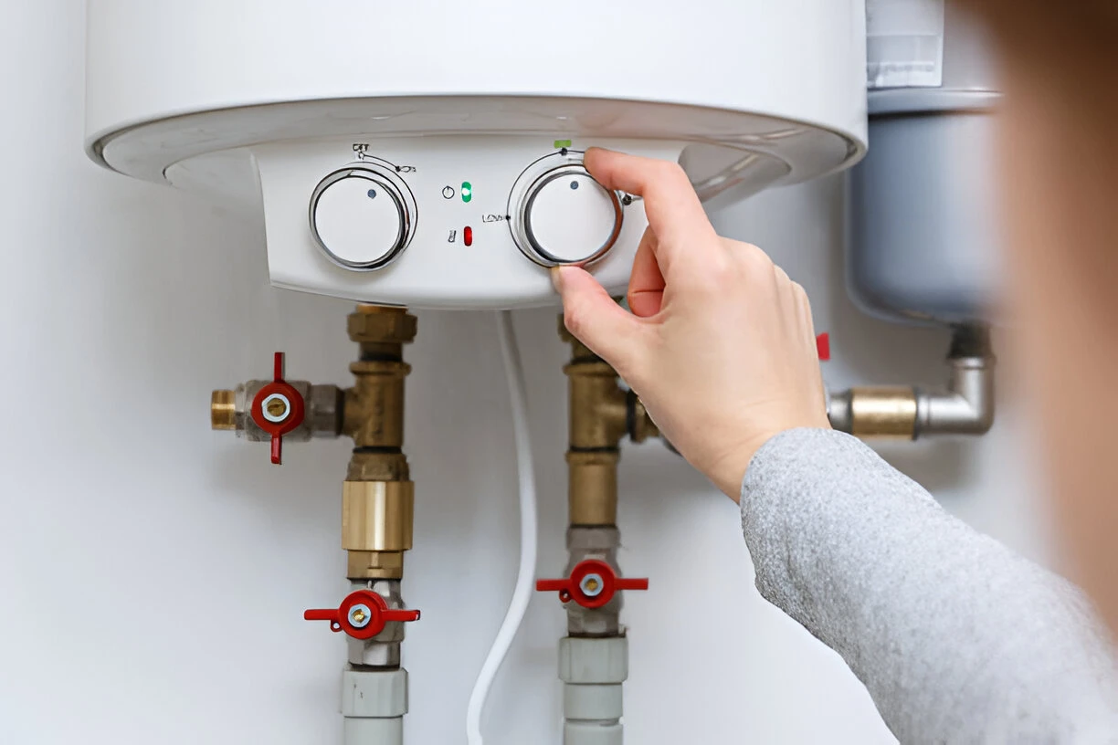 Technician working on a residential heating system during winter in Los Angeles